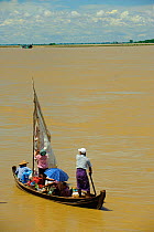 People on a boat in the Ayeyarwady river, from Mandalay to Bagan, Myanmar, Burma. September 2009
