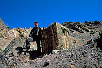 Doug Allan next to hide for filming Snow leopards for BBC series Planet Earth, near Rombuk village, Hemis National Park, Ladakh, India, January 2004