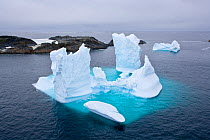 Aerial view of iceberg, with majority of berg visible under the water, Antarctic peninsula, February 2007