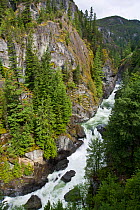 Waterfall in narrow gorge, on the Rocky Mountaineer tourist train route, near Whistler, British Columbia, Canada, June 2007