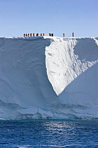 Tourists standing on top of the Ross Ice Shelf, Antarctica, December 2008