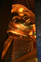 Giant statue of reclining Buddha, Wat Po temple (the largest Buddhist temple in Thailand) Bangkok, Thailand , October 2006