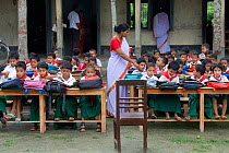 School teacher with class of Primary school children, nr Tala, Ganges delta, Bangladesh, June 2008
