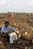 Scheme for providing tea for people searching landfill site for recyclable objects, Dhaka, Bangladesh, November 2008