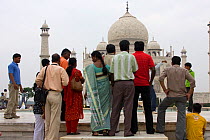 Tourists viewing the Taj Mahal, tomb of Humayan, Uttar Pradesh, India, October 2008