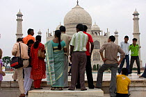Tourists viewing the Taj Mahal, tomb of Humayan, Uttar Pradesh, India, November 2008