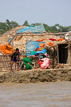 Village community at risk from rising sea levels due to climate change, Sundarbans, Bangladesh, November 2008