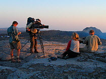 Film crew filming on the lava field of Erta Ale volcano, The Rift Valley, Ethiopia, November 2003, Filming for the Mountains episode of BBC NHU tv series, Planet Earth.  Chadden Hunter, Ted Giffords,...