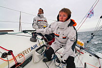 Fabien Delahaye (foreground) and Armel Le Cléac'h aboard Figaro yacht "Brit Air", Transat AG2R, Port la Foret, Brittany, March 2010.