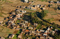 Aerial view of houses and agricultural fields, Himalayan foothills, Nepal, November 2007