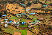 Aerial view of buildings  surrounded by agricultural fields, Himalayan foothills, Nepal, December 2007