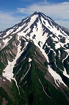 Aerial view of Gorely volcano (1,829m) with snow on slopes, Kamchatka, Russia, August 2006