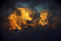 Donguzuron mountain (4,468m) (left) and Makratau (4,269m) at sunset, seen from Mount Elbrus, Caucasus, Russia, June 2008