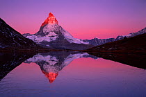 Matterhorn (4,478m) with reflection in Lake Riffel at sunrise, Switzerland, September 2008. WWE BOOK. WWE OUTDOOR EXHIBITION. NOT TO BE USED FOR GREETING CARDS OR CALENDARS TILL 2013 PRESS IMAGE.