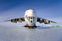 Ilyushin 76, a four-engined cargo plane, is unloaded on the parking ramp of the Blue Ice runway at the base of ALE (Antarctic Logistics and Expeditions). Patriot Hills, Antarctica, January 2006.