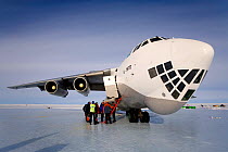 Ilyushin 76 with departing tourists on Blue Ice runway at the base of ALE (Antarctic Logistics and Expeditions). Patriot Hills, Antarctica, January 2006.