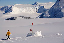 Woman visiting the field toilet at Mount Vinson Base Camp. Vinson Massif, Antarctica, January 2006.