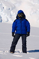 Mountain guide demonstrates clothing layers (outer layer) at Mount Vinson Base Camp. Vinson Massif, Antarctica, January 2006.
