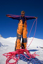 Norwegian mountaineer preparing the ropes for his climb at Mount Vinson Base Camp. Vinson Massif, Antarctica, January 2006.