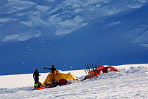Norwegian mountaineers and their tents at Mount Vinson Base Camp. Vinson Massif, Antarctica, January 2006.