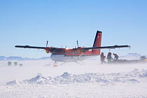 Refuelling a Twin Otter in a high wind. Patriot Hills, Antarctica, January 2006.