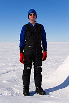 Man demonstrating clothing layers (mid layer) at Mount Vinson Base Camp. Vinson Massif, Antarctica, January 2006.