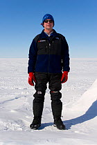 Man demonstrating clothing layers (outer mid layer) at Mount Vinson Base Camp. Vinson Massif, Antarctica, January 2006.