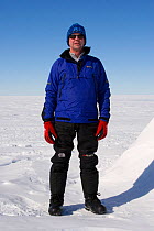 Man demonstrating clothing layers (outer mid layer) at Mount Vinson Base Camp. Vinson Massif, Antarctica, January 2006.