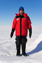 Man demonstrating clothing layers (outer layer) at Mount Vinson Base Camp. Vinson Massif, Antarctica, January 2006.