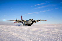 C130 equipped with skis takes off at Patriot Hills. Antarctica, January 2006.
