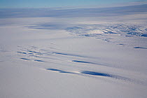 Crevasses in the Polar Plateau, partly covered in snow. Antarctica, January 2006.