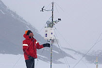 Man looking at radio mast, Patriot Hills, Antarctica, January 2006.