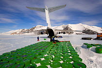 Unloading fuel from the Ilyushin 76TD on the Blue Ice Runway at Patriot Hills. Antarctica, January 2006.