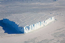 Tabular iceberg patterned with old crevasses. Snow Hill Island, Antarctica, October 2006.
