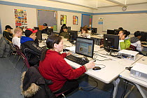11th Grade Inuit students search the internet for information on climate change during a computer class at the school in Pangnirtung. Nunavut, Canada, April 2008.