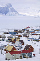 Inuit community of Pangnirtung with the frozen Pangnirtung Fiord in the background. Nunavut, Canada, April 2008.