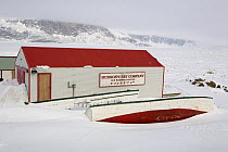 Hudson Bay Company, old whaling station and boats at Pangnirtung. Nunavut, Canada, April 2008.