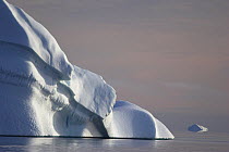Detail of Iceberg in a calm sea, Scoresbysund Fjord, East Greenland, September 2005.