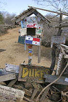 Visitors have decorated the mail barrel at Post Office Bay, Floreana, Galapagos Islands, January 2005.