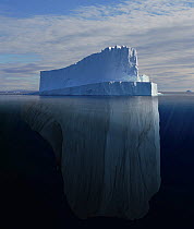 Tabular iceberg showing the portion underwater that is sculpted by the sea. Polar regions. Digitally created image composite