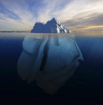 Melting iceberg showing the portion underwater that is sculpted by the sea. Polar regions. Digitally created image composite
