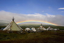 Rainbow over Khanty reindeer herders' camp in the Polar Ural Mountains. Yamal, Western Siberia, Russia, Summer 2007.