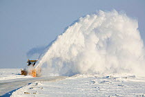 Snow blower clearing a winter road near the Yurharovo gas field north of Noviy Urengoi. Yamal, Western Siberia, Russia.