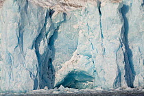 Bright blue ice at the end of a tidewater glacier where ice has recently fallen. Kongsbreen, Kongsfjord, Spitsbergen, Svalbard, Norway, June 2008.