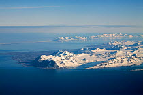 Aerial view of the south of Oscar II Land seen from above the Isfjorden. Prins Karls Forland behind. Spitsbergen, Svalbard, Norway, June 2008.