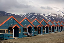 Brightly coloured timber residential buildings in Longyearbyen. Spitsbergen, Norway, June 2006.