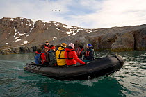 Passengers from "The Stockholm" in a zodiac by Blomstrand, Kongsfjorden, Svalbard, Norway, June 2006.