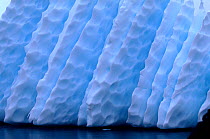 Ridges and dimples on an iceberg, Antarctica.
