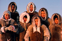 Inuit children dressed in reindeer skin clothing. Baffin Island, Nunavut, Canada, 1987. Editorial use only.