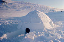 Igloo built with blocks of snow. Igloolik, Nunavut, Canada, 1990.